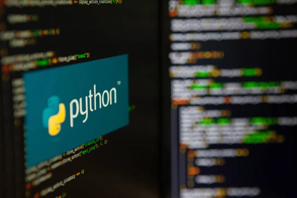 Python emblem on screen with code