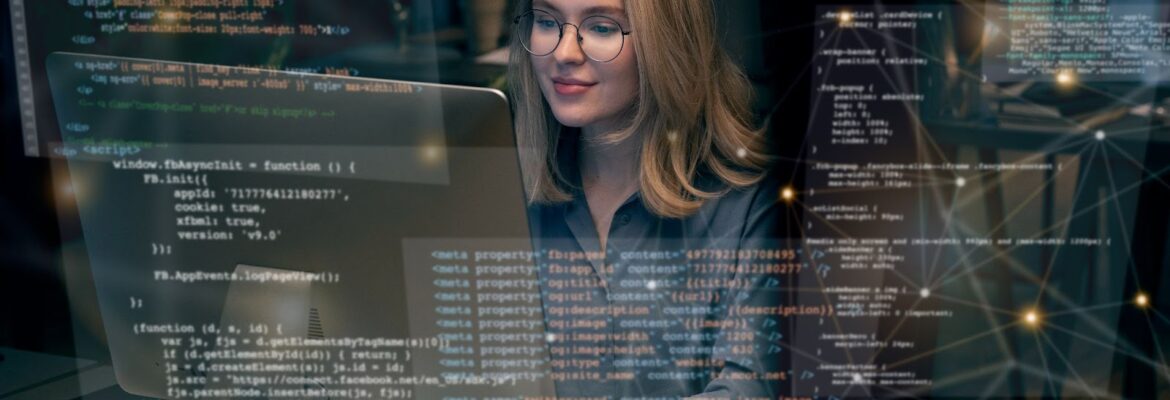 A woman works at a computer